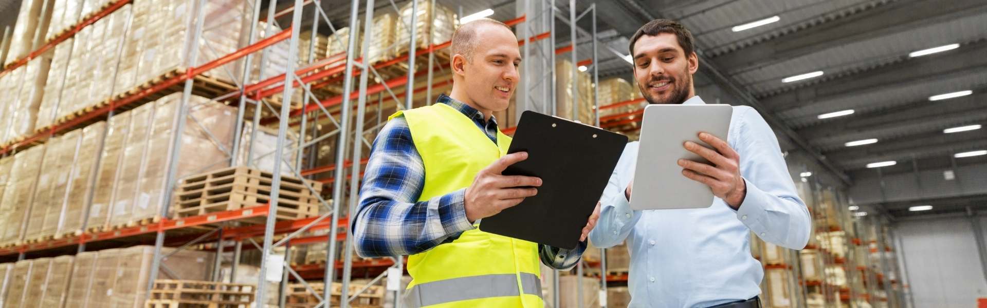 warehouse workers with clipboard