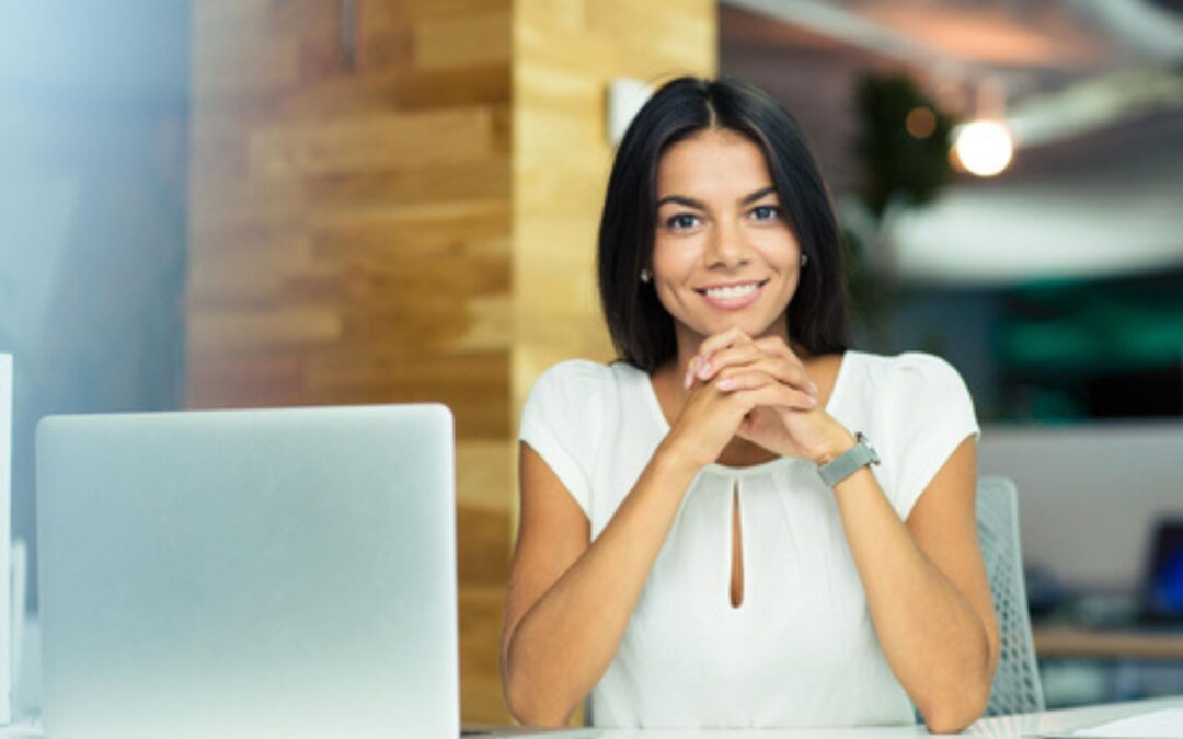 workers comp insurance underwrite - woman at computer